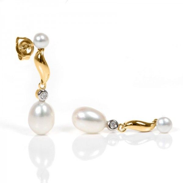 Freshwater Pearl and Diamond S shape drop earrings.