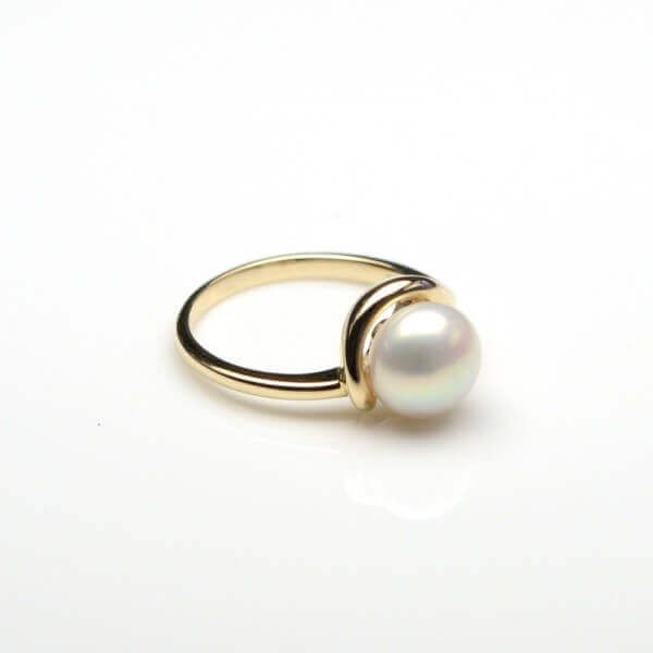 Yellow  gold freshwater pearl swirl ring design