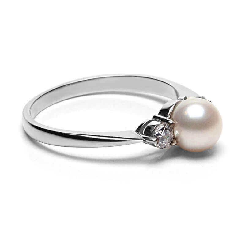 Three stone pearl and diamond ring side view